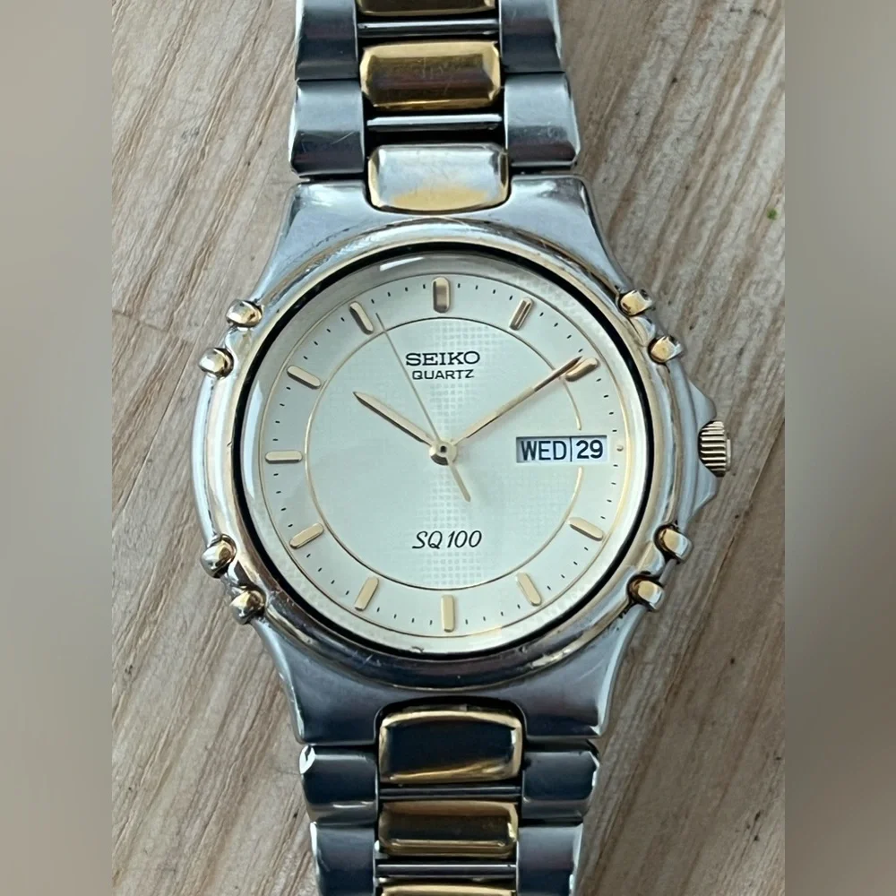 Seiko SQ 100 Rare Vintage Men’s Watch Light Gold-Tone Dial Two-Tone Bracelet